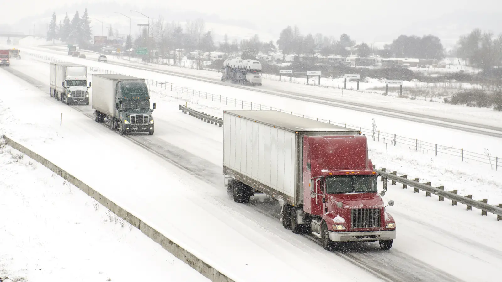 driving-in-winters-canada-trucks.webp